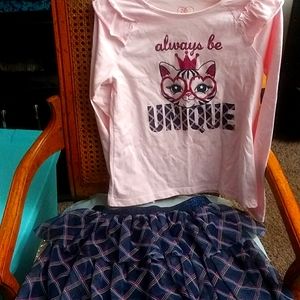 A two-piece skirt and shirt set size 10 little girls(used)